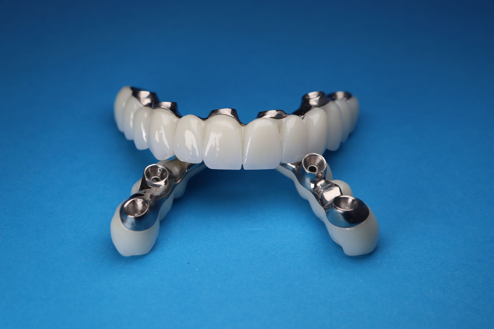 Close-up of a dental implant prosthetic model